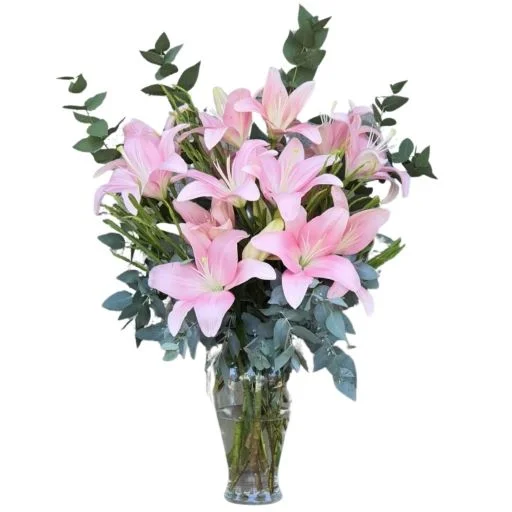 Florero con flores lilium lirios rosados